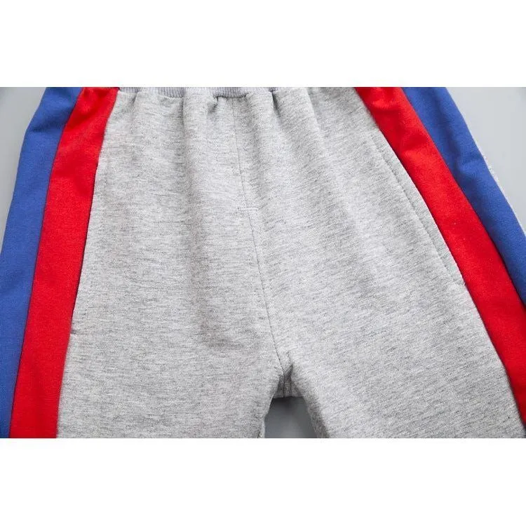 Boy sports wind suit