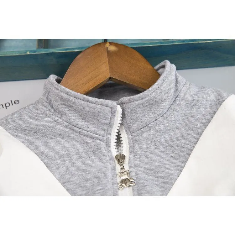 Boy sports wind suit