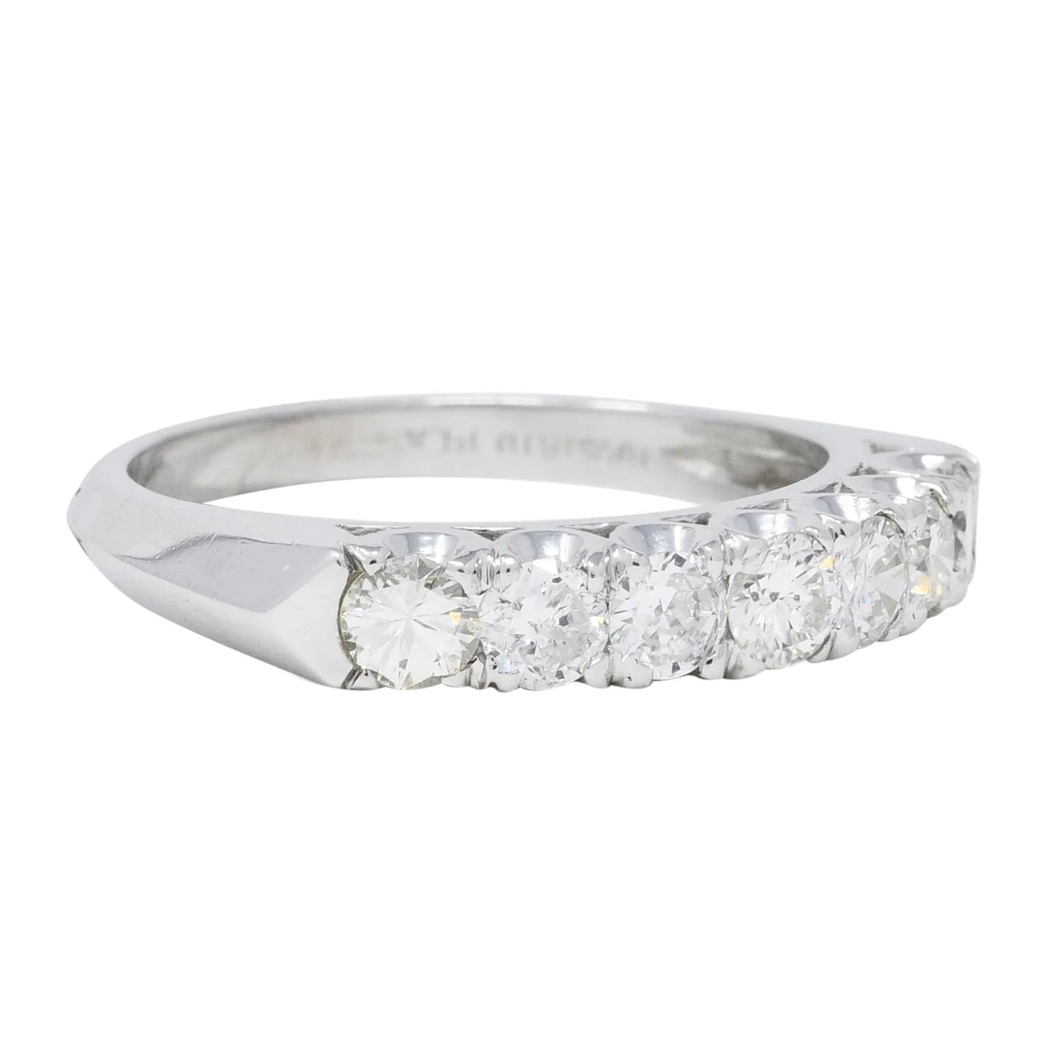 Mid-Century 0.70 CTW Diamond Platinum Seven Stone Vintage Fishtail Band Ring