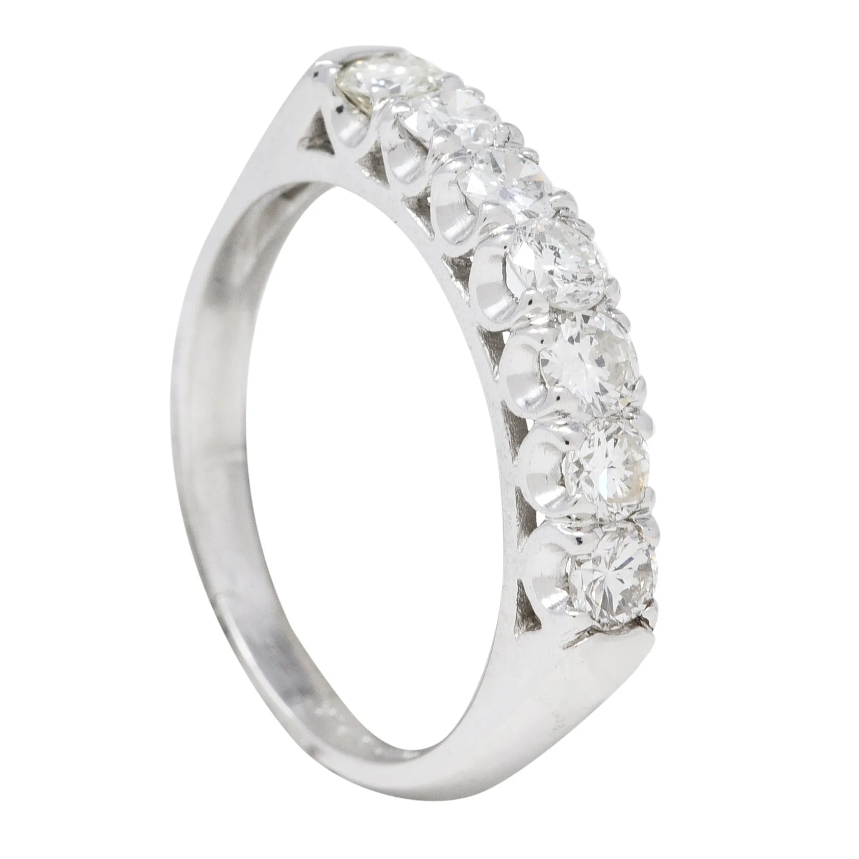 Mid-Century 0.70 CTW Diamond Platinum Seven Stone Vintage Fishtail Band Ring