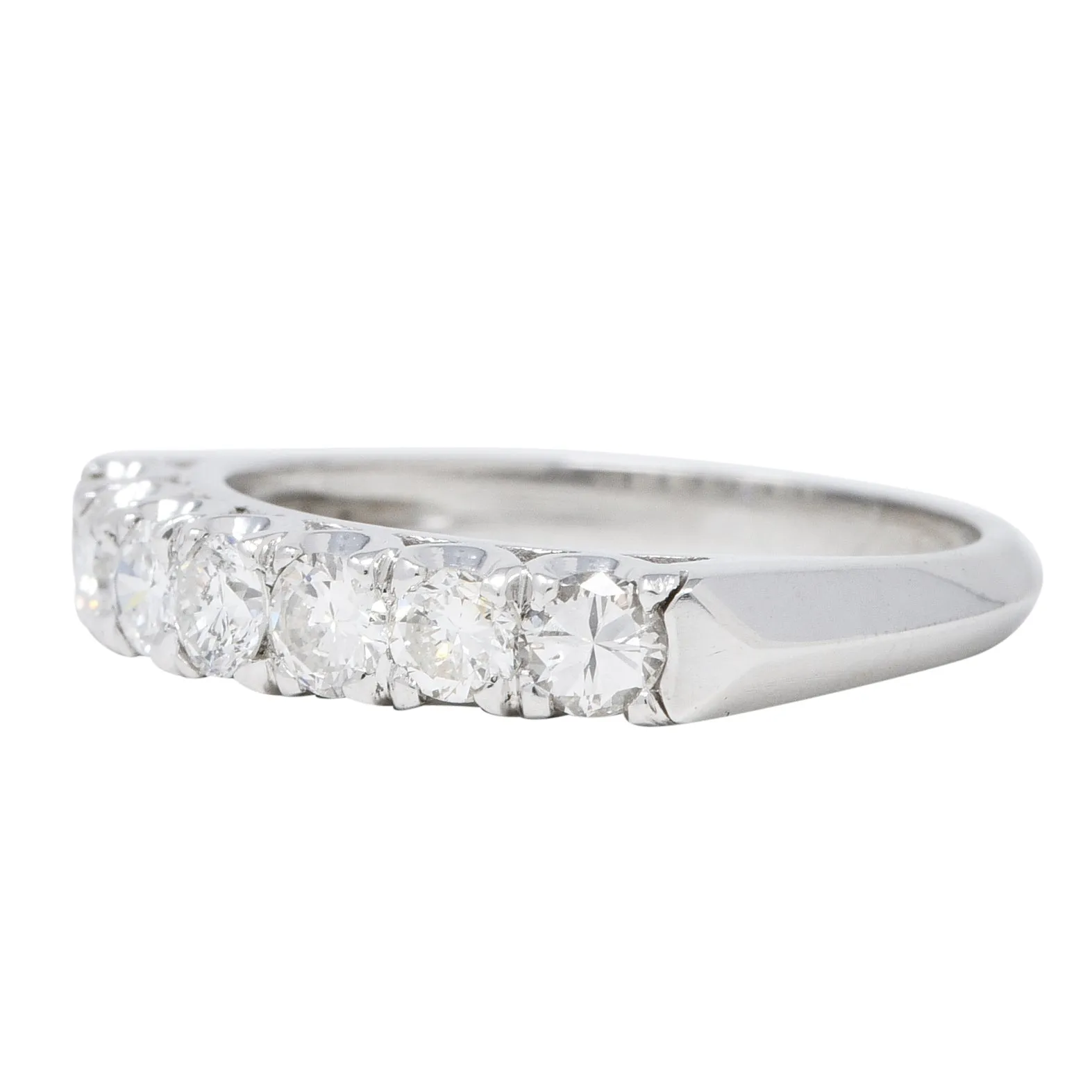 Mid-Century 0.70 CTW Diamond Platinum Seven Stone Vintage Fishtail Band Ring