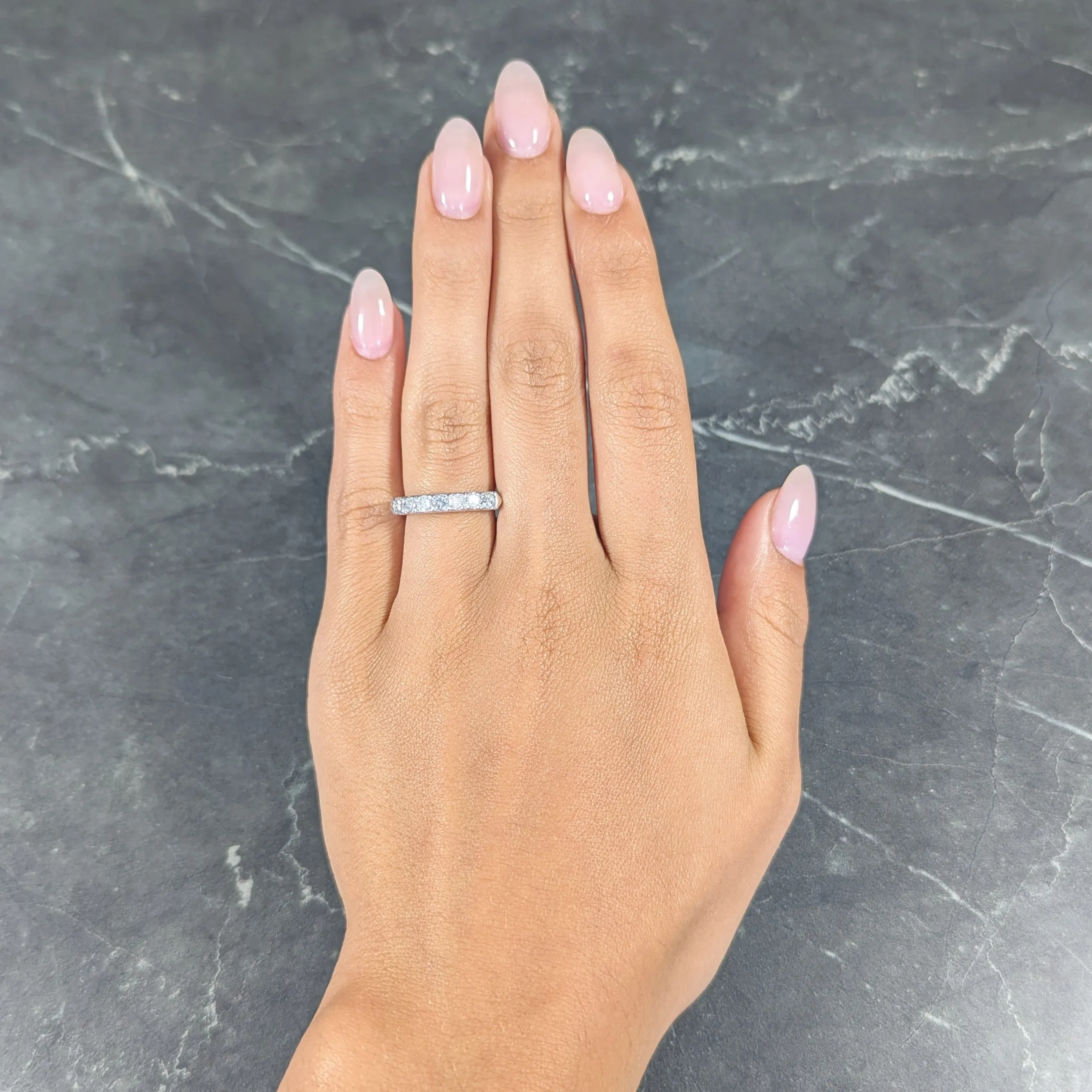 Mid-Century 0.70 CTW Diamond Platinum Seven Stone Vintage Fishtail Band Ring
