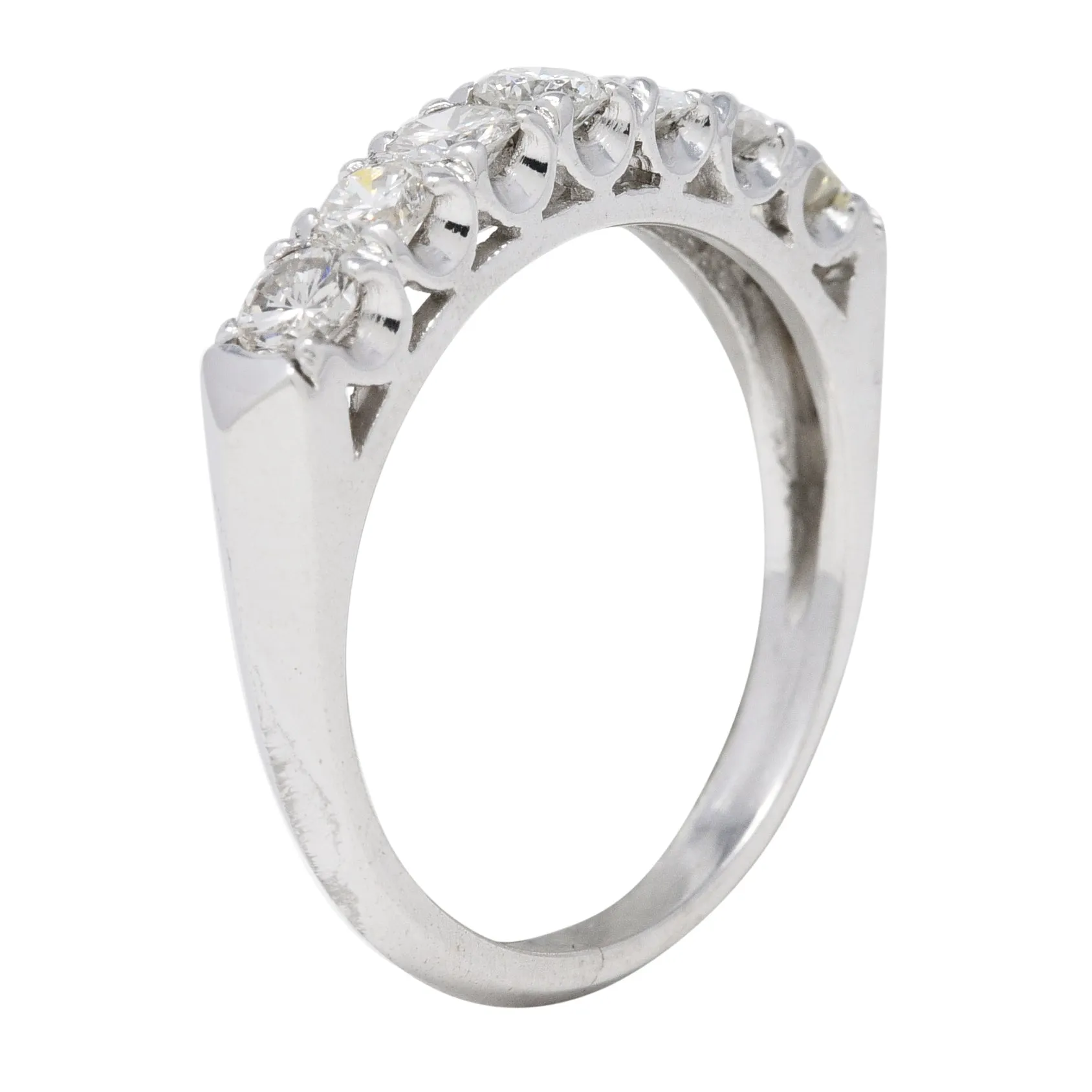 Mid-Century 0.70 CTW Diamond Platinum Seven Stone Vintage Fishtail Band Ring