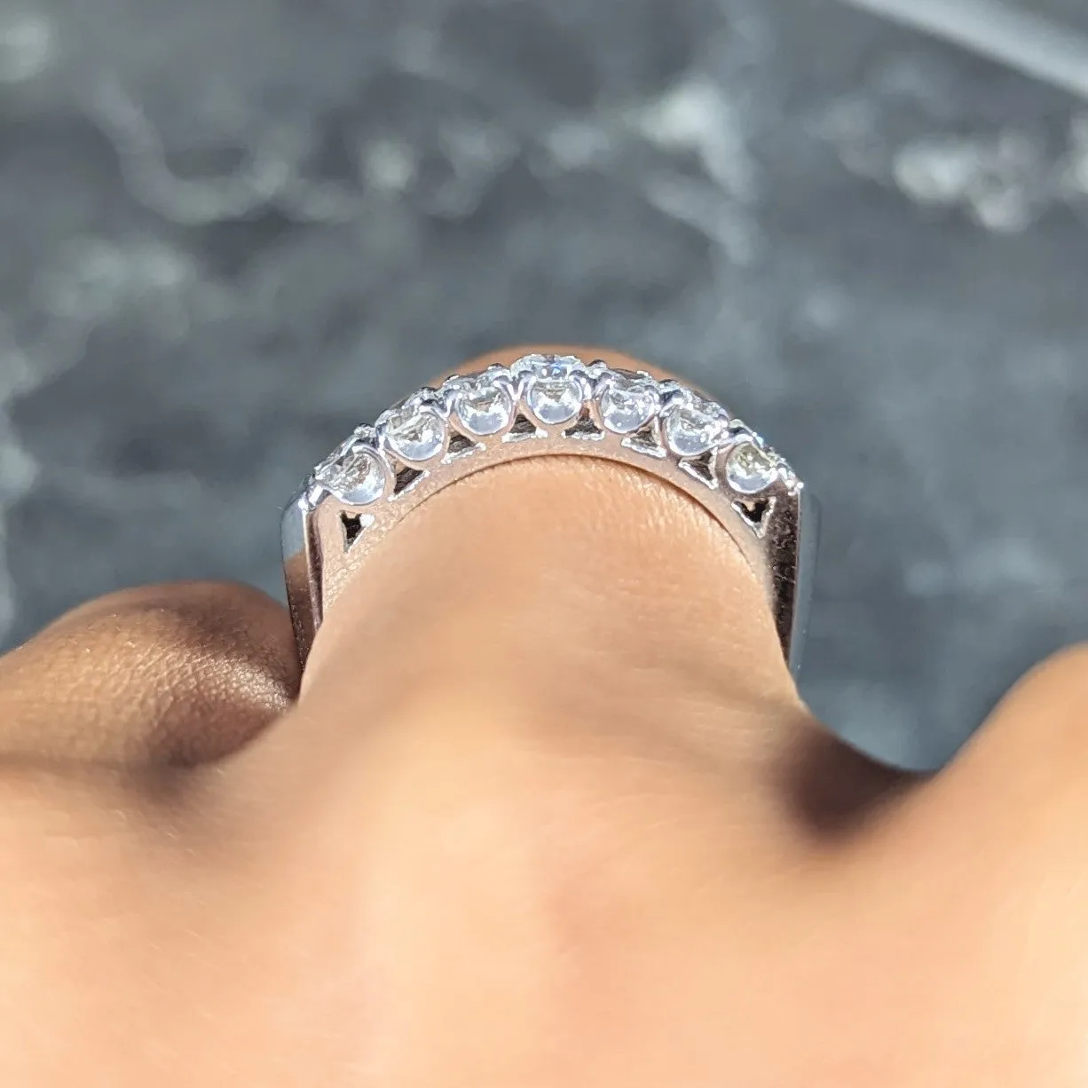 Mid-Century 0.70 CTW Diamond Platinum Seven Stone Vintage Fishtail Band Ring