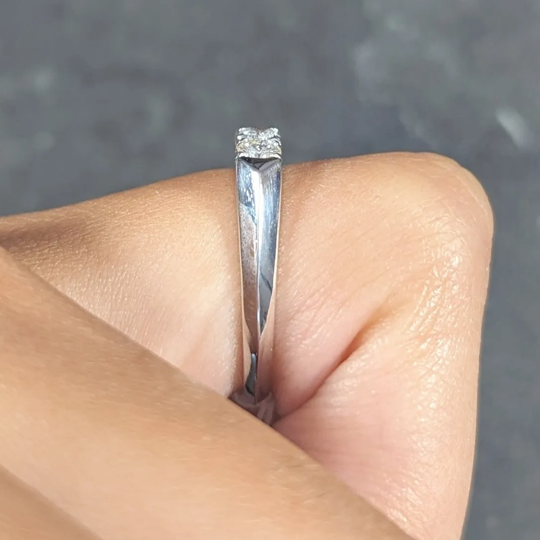 Mid-Century 0.70 CTW Diamond Platinum Seven Stone Vintage Fishtail Band Ring