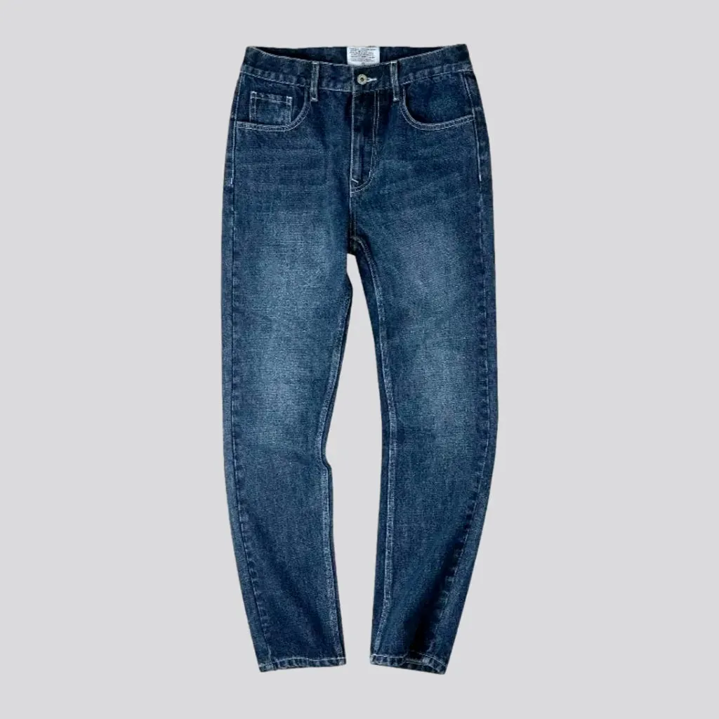 Stonewashed back-cinch tapered men's jeans