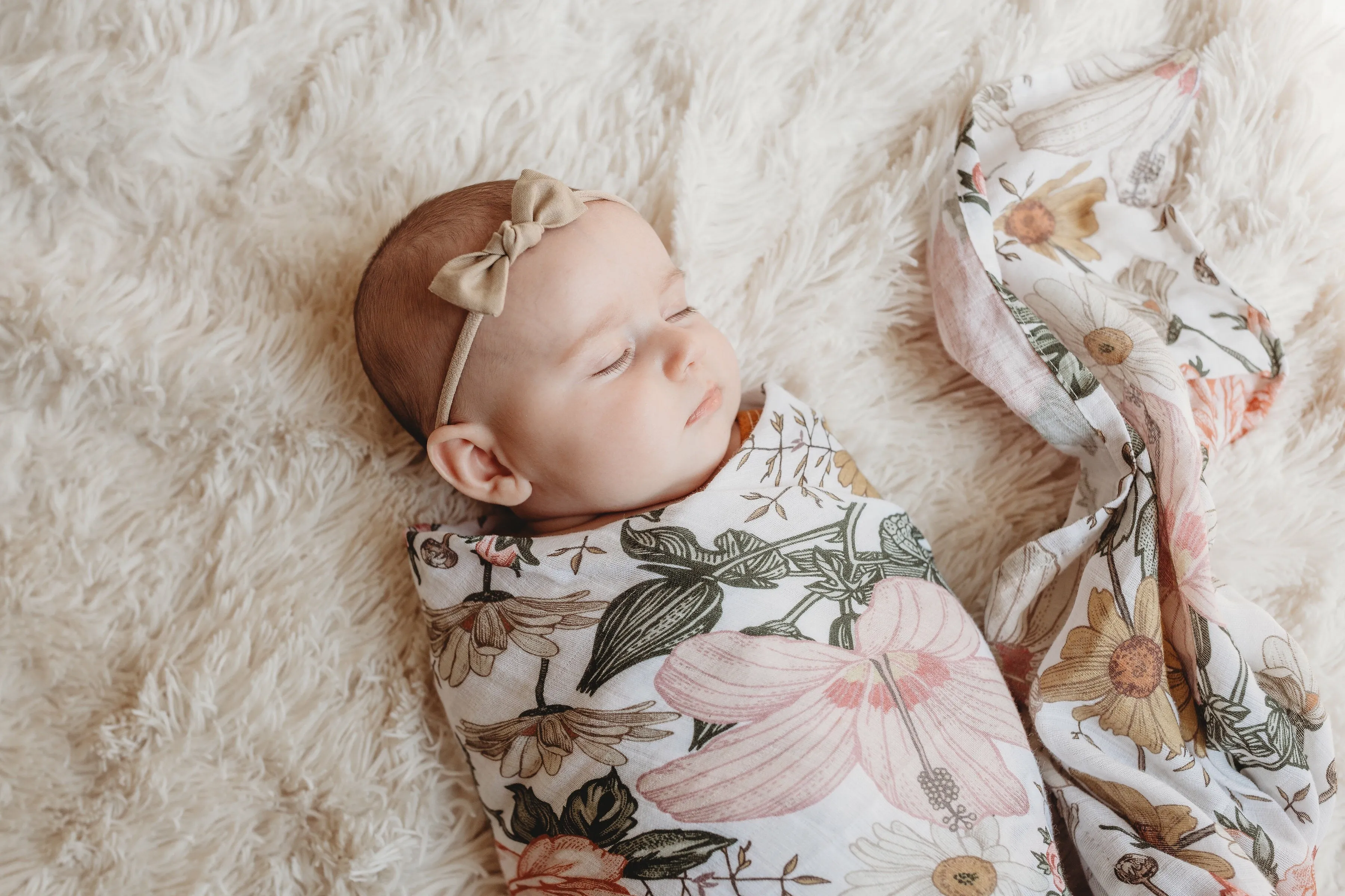 The Mini Scout Garden Floral swaddle